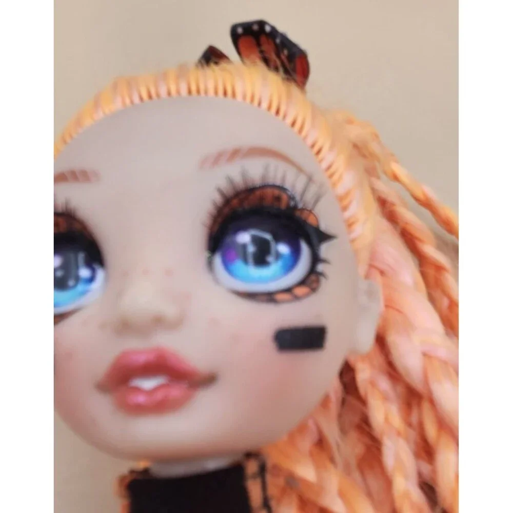 Rainbow High Junior Poppy Rowan Orange Fashion Doll Butterfly Monarch Bow